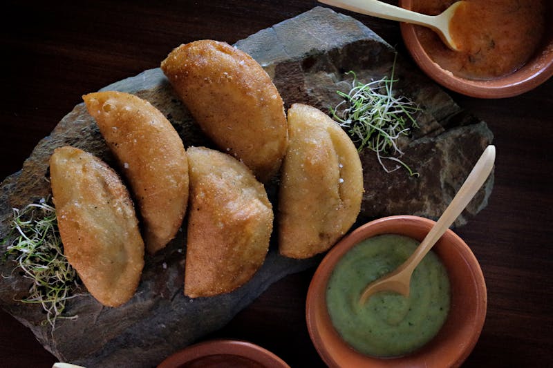 Mod Pizza kitchen team preparing fresh ingredients